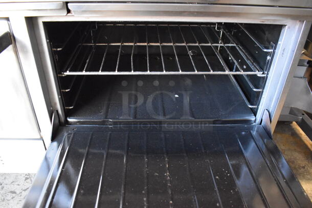 Stainless Steel Commercial Natural Gas Powered 10 Burner Range w/ 2 Ovens, Over Shelf and Back Splash on Commercial Casters. 60x33x58 - Image 7 of 7