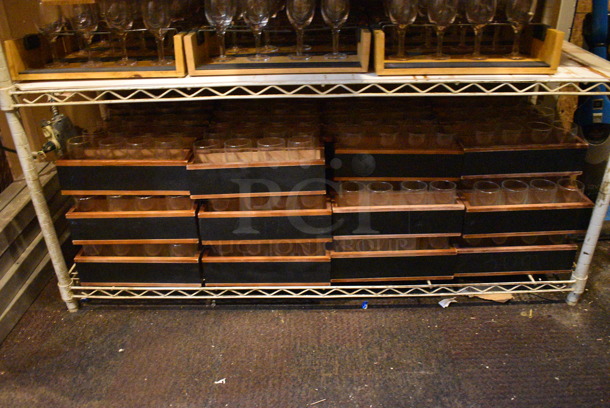 White Finish 3 Tier Wire Shelving Unit w/ Contents Including Wine Glasses. 48x18x36. BUYER MUST REMOVE; BUYER MUST DISMANTLE. PCI CANNOT DISMANTLE FOR SHIPPING. PLEASE CONSIDER FREIGHT CHARGES. (glass room - off of bar area) - Image 2 of 7