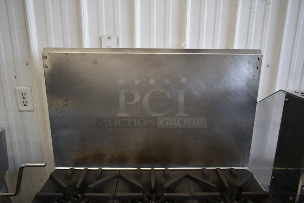 Garland G36-6R Stainless Steel Commercial Natural Gas Powered 6 Burner Range w/ Oven and Back Splash. - Image 3 of 8