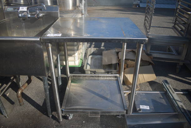 Commercial Stainless Steel Work Table On Galvanized Legs With Pull Out Undershelf With Commercial Casters.