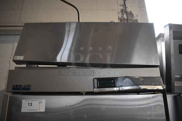 Norlake NR1SS Stainless Steel Commercial Single Door Reach In Cooler w/ Poly Coated Racks. 115 Volts, 1 Phase. 28x34x83.5. Tested and Powers On But Does Not Get Cold - Image 3 of 7