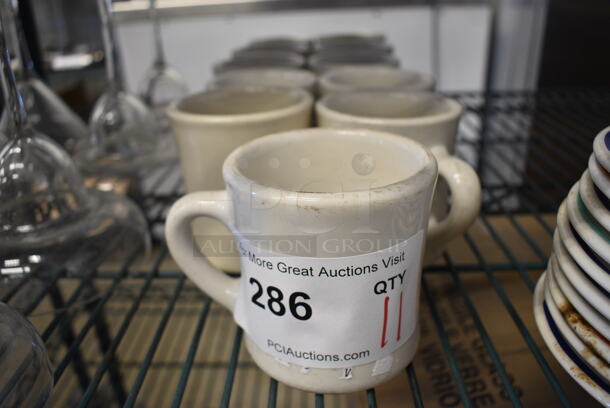 11 White Ceramic Mugs. 4.5x3.5x3.5. 11 Times Your Bid!