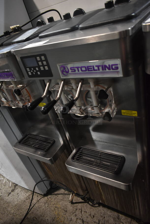 2014 Stoelting F231-18I2-SFAD Stainless Steel Commercial Floor Style Water Cooled 2 Flavor w/ Twist Soft Serve Ice Cream Machine on Commercial Casters. 208-240 Volts, 3 Phase.