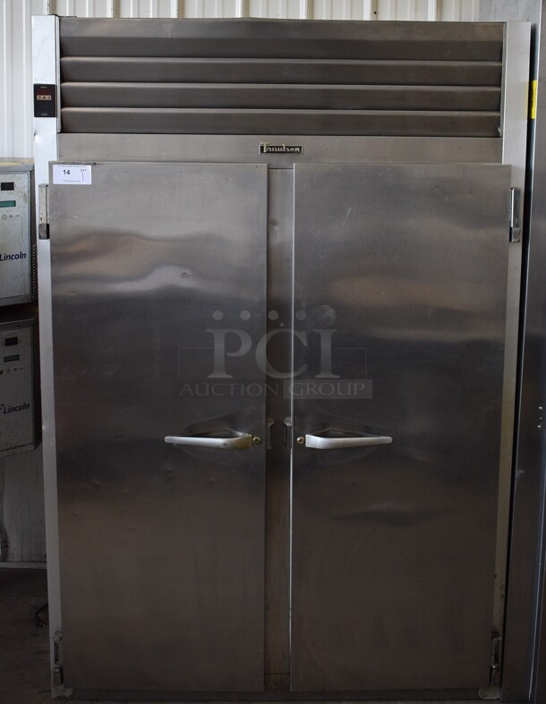 Traulsen Model G22010 ENERGY STAR Stainless Steel Commercial 2 Door Reach In Freezer w/ Poly Coated Racks. 115 Volts, 1 Phase. 31.5x34x78. Tested and Does Not Get Cold