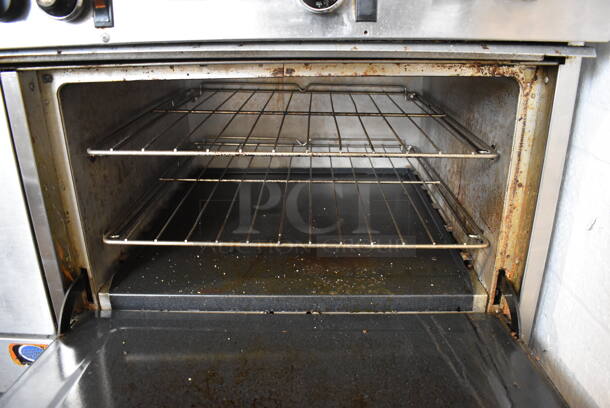 Southbend Select Stainless Steel Commercial Natural Gas Powered 6 Burner Range w/ Flat Top Griddle, 2 Ovens, Over Shelf and Back Splash. 61x35x60 - Image 9 of 10