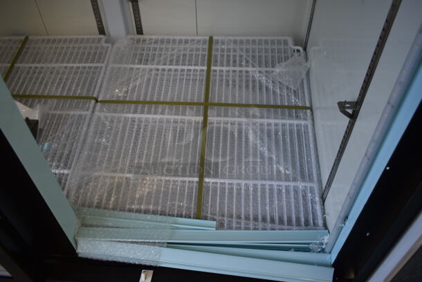 BRAND NEW SCRATCH AND DENT! 2023 Avantco 178GDC49FHCB Metal Commercial 2 Door Freezer Merchandiser w/ Poly Coated Racks on Commercial Casters. 115 Volts, 1 Phase. Tested and Working! - Image 11 of 12