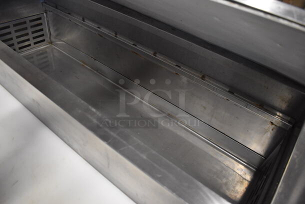 Avantco 178PICL1 Stainless Steel Commercial Pizza Prep Table w/ Oversized Cutting Board on Commercial Casters. 115 Volts, 1 Phase. 50x37x46. Tested and Powers On But Does Not Get Cold - Image 4 of 6