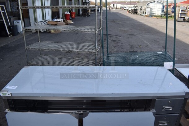 BRAND NEW SCRATCH AND DENT! Regency 600EBT2472R Stainless Steel Commercial 24" x 72" 16 Gauge Type 304 Enclosed Base Sliding Door Table with Drawers - Image 10 of 10