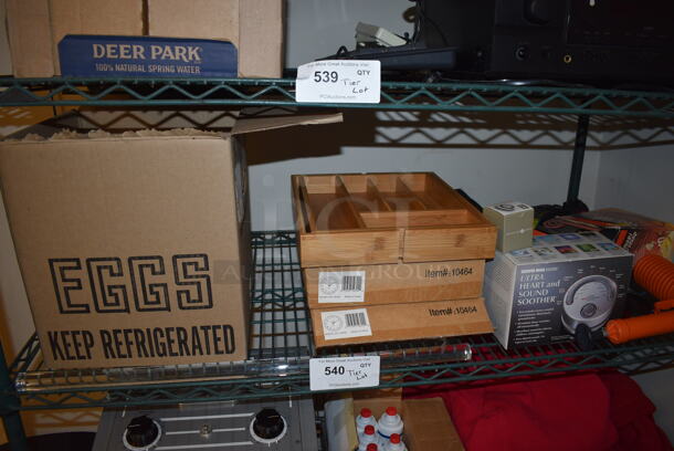 ALL ONE MONEY! Tier Lot of Various Items Including Ultra Heart and Sound Soother, Wooden Utensil Drawer Organizer, Heat/Cold Wrap, Brushes, and Wall Mount Clocks - Image 1 of 7