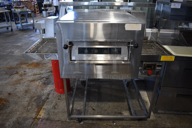 Doyon FC-1 Stainless Steel Commercial Floor Style Electric Powered Conveyor Pizza Oven on Commercial Casters. 208 Volts. 59x44x49 - Image 1 of 7