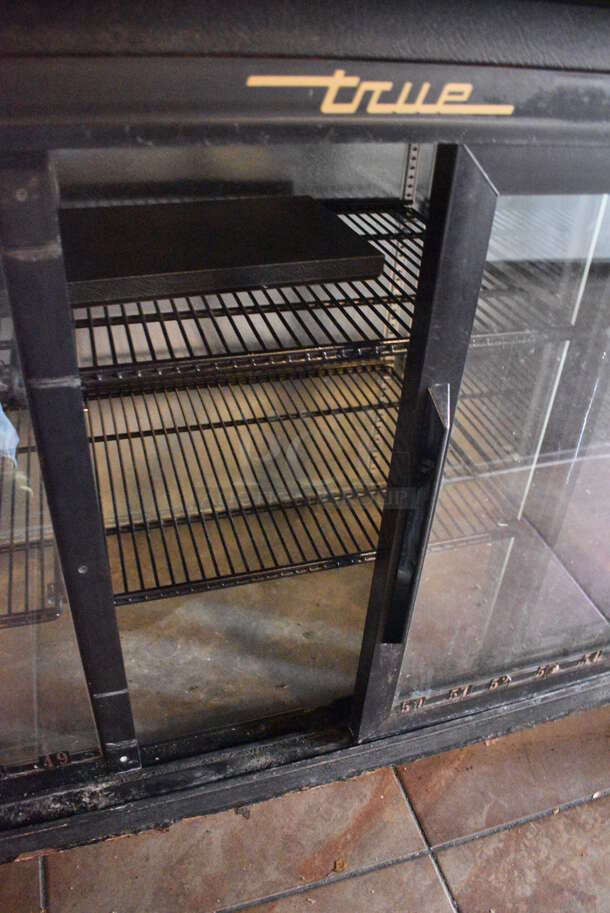 2013 True TBB-24-72G-SD Metal Commercial 3 Door Back Bar Cooler Merchandiser. BUYER MUST REMOVE. 115 Volts, 1 Phase. 73x24.5x36. Item Was in Working Condition on Last Day of Business. (Susquehanna Ale House) - Image 5 of 7