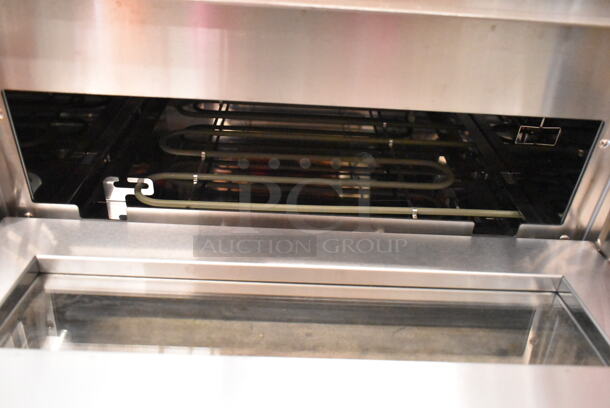 BRAND NEW SCRATCH AND DENT! Avantco 177DPO18S Stainless Steel Commercial Countertop Electric Powered Single Deck Pizza Oven w/ Cooking Stone. 120 Volts, 1 Phase. Tested and Working! - Image 5 of 7