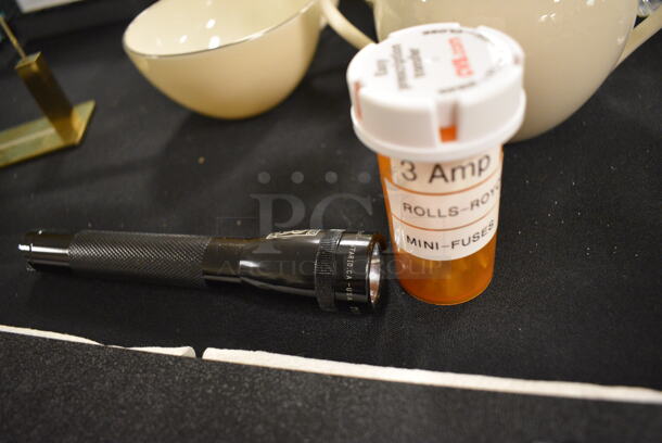 ALL ONE MONEY! Lot of Rolls Royce Items Including Clock, License Plate Cover, Cuff Links, Windshield Wiper Blades, Spirit of Ecstasy Emblem, Flash Light, Aprons, Car Parts and Mini Fuses - Image 5 of 12