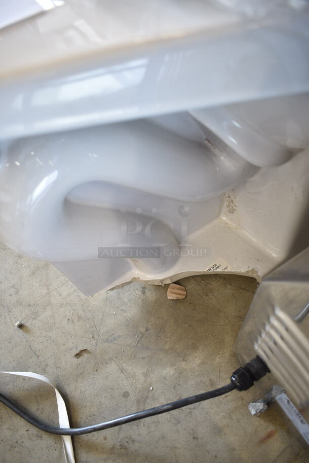 BRAND NEW SCRATCH AND DENT! White Toilet w/ Zurn Z5955SS-EL Toilet Seat and Zurn Flush Valve.  - Image 5 of 8