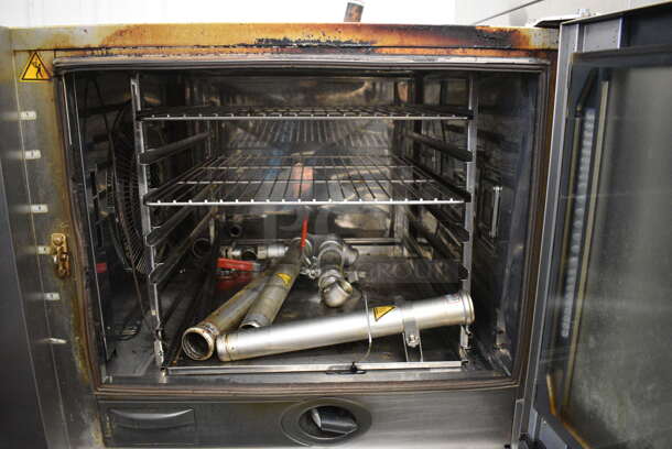 2 2016 Rational Stainless Steel Commercial Combitherm Self Cooking Center Convection Ovens on Commercial Casters. Top Model: SCC WE 62. Bottom Model: SCC WE 102. Picture of Unit Powered on is Included. 480 Volts, 3 Phase. 42x42x73. 2 Times Your Bid! - Image 5 of 11