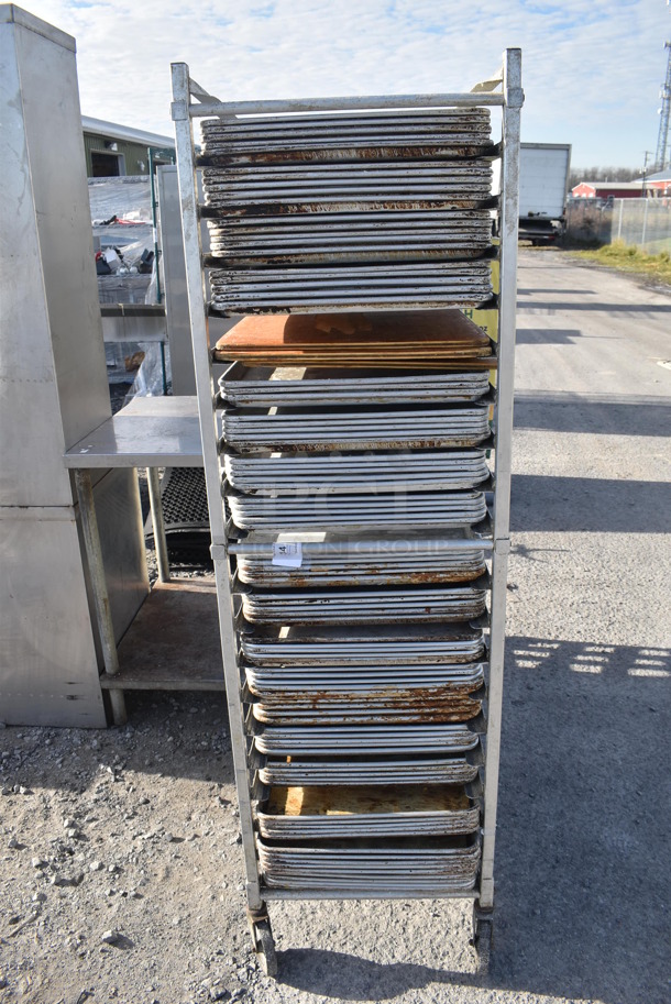 Metal Commercial Pan Transport Rack w/ Various Metal Baking Pans on Commercial Casters. 21x26.5x69