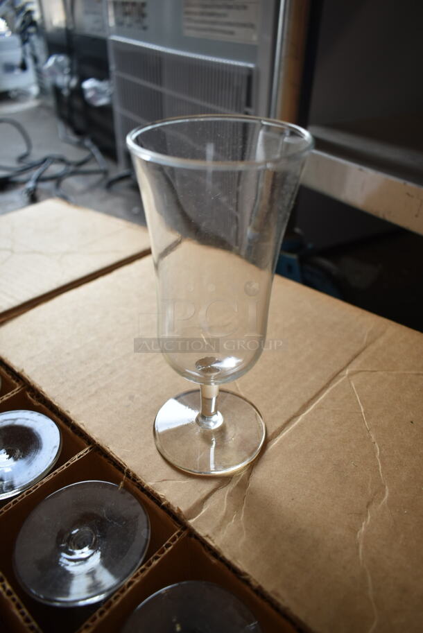 ALL ONE MONEY! Lot of Approximately 19 Items Including Old Tyme Nut Grinder Base, Cuisinart Coffee Machine, Box of Brandy Snifter Glasses, Poly Bins, Salad Plates, Faucet, Spray Nozzle Attachment. Does Not Include Table.  - Image 7 of 12