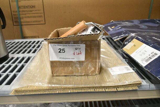 BRAND NEW SCRATCH AND DENT! Lot of Various Items Including 471BPRESS84 Choice 8" x 4" Wood Handle Bacon Press, 6 Garde 181COM1KNIFE Heavy Duty Manual Can Opener Knife, 19164910CAML RITZ® 64910 19" x 13" Camel Grass Cloth PVC Coated Placemat - 12/Pack.  - Image 1 of 8
