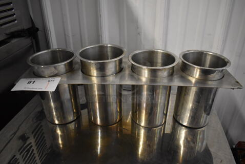 4 Metal Bins in Panel.