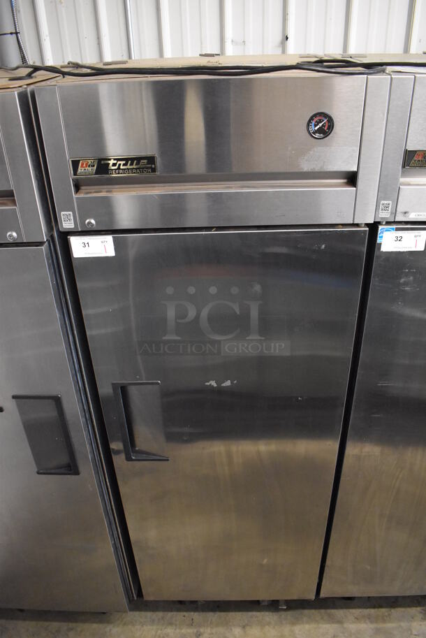 2011 True TG1R-1S Stainless Steel Commercial Single Door Reach In Cooler w/ Poly Coated Racks on Commercial Casters. 115 Volts, 1 Phase. 29x35x83. Tested and Working!