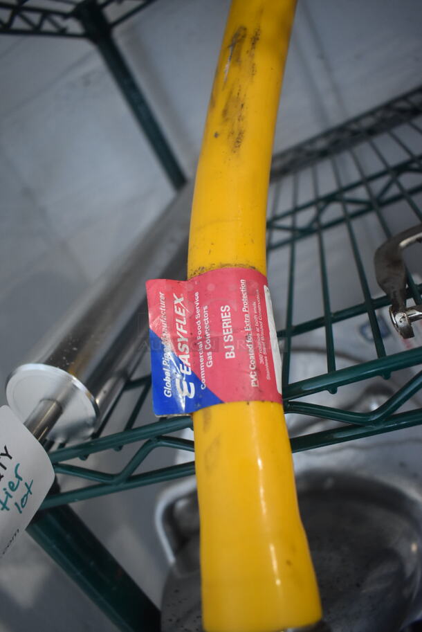 ALL ONE MONEY! Tier Lot of Various Items Including Gas Hose and Can Opener - Image 4 of 5