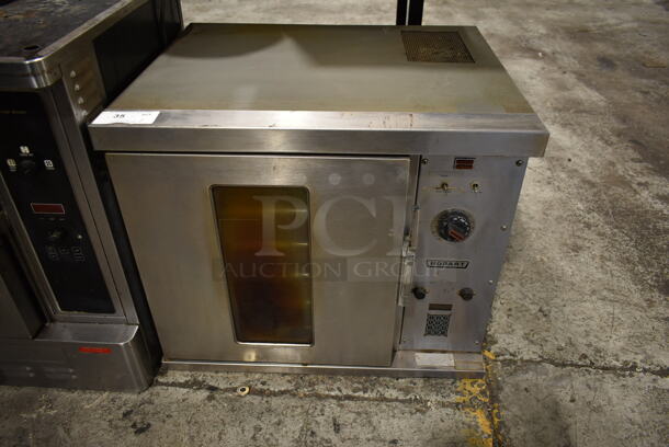 Hobart CN85 Stainless Steel Commercial Electric Powered Half Size Convection Oven w/ View Through Door, Thermostatic Controls and Metal Oven Racks. 208/230 Volts, 3 Phase.