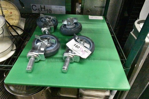 ALL ONE MONEY! Lot of 4 Commercial Casters and 1 Green Cutting Board. 