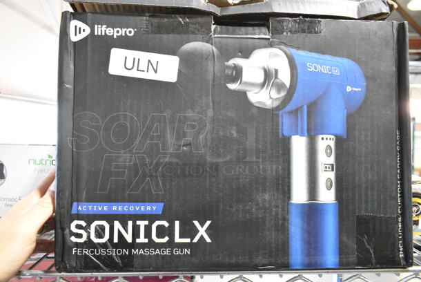 4 IN ORIGINAL BOX! Items Including Lifepro Sonic LX Percussion Massage Gun, Pyle Speaker, Tranqwil Foot Massager, Miko Foot Massager. 4 Times Your Bid!  - Image 2 of 9