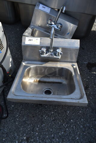 Stainless Steel Commercial Single Bay Wall Mount Sink w/ Faucet and Handles.