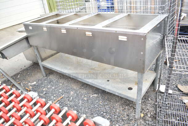 Eagle AWT4-LP Metal Commercial Natural Gas Powered 4 Well Steam Table w/ Under Shelf. 30,000 BTU.  - Image 1 of 5