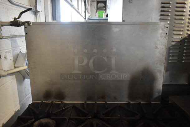 Garland SunFire X36-6R Stainless Steel Commercial Natural Gas Powered 6 Burner Range w/ Oven and Back Splash. - Image 3 of 8