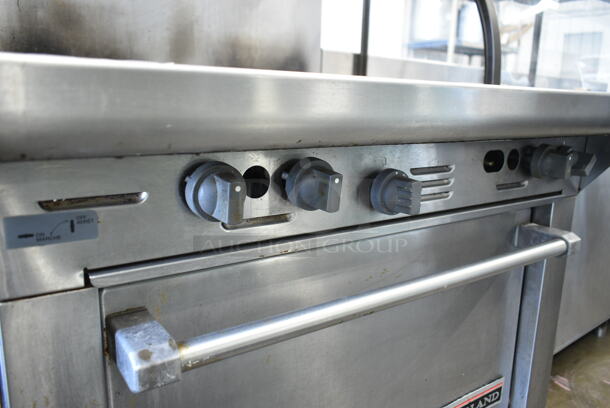 Garland M44R Stainless Steel Commercial Natural Gas Powered 4 Burner Range w/ Oven, Over Shelf and Back Splash on Commercial Casters.  - Image 4 of 9
