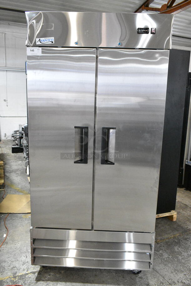 BRAND NEW SCRATCH AND DENT! 2024 Avantco 178A35FHC Stainless Steel Commercial 2 Door Reach In Cooler w/ Poly Coated Racks on Commercial Casters. 115 Volts, 1 Phase. Tested and Working! - Image 1 of 7