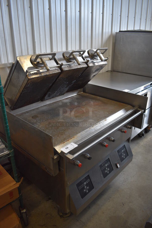 Stainless Steel Commercial Floor Style Electric Powered 3 Part Clamshell Panini Press Flat Top Griddle on Commercial Casters. 250 Volts, 3 Phase. 41x44x53
