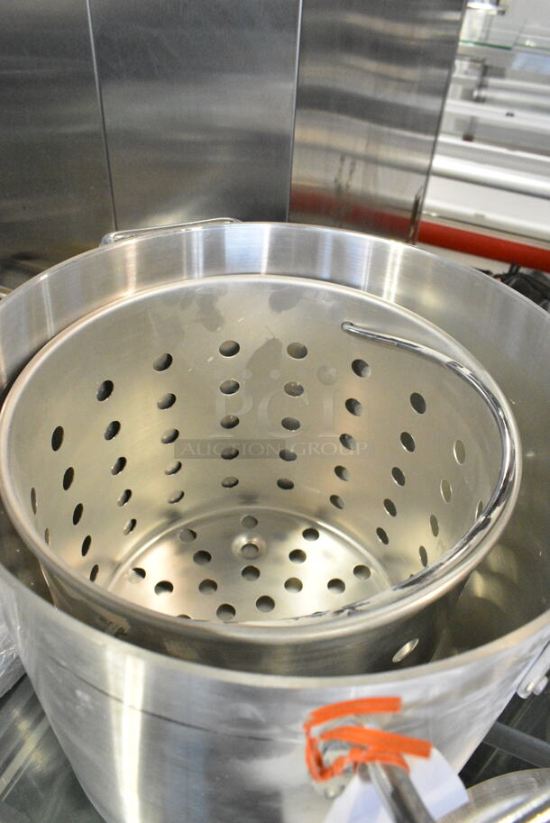 3 BRAND NEW SCRATCH AND DENT! Items Including 471ASTB20 Choice 20 Qt. Aluminum Stock Pot Steamer Basket, 471ASTB20ST Choice 20 Qt. Standard Weight Aluminum Stock Pot with Steamer Basket and Cover, Metal Stock Pot. 3 Times Your Bid!  - Image 6 of 9