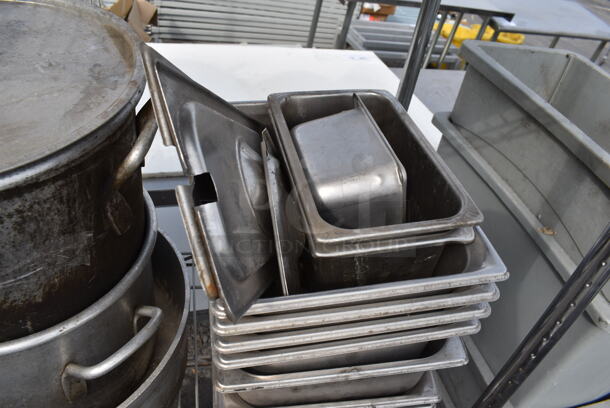 ALL ONE MONEY! Metro Shelf Lot Including Stainless Steel Drop In Bins, Child Seat, Pots, Pans and Lids, Metal and Poly Trays and MORE. Includes 3 Tier Shelving Unit! BUYER MUST DISMANTLE. PCI CANNOT DISMANTLE FOR SHIPPING. PLEASE CONSIDER FREIGHT CHARGES. - Image 4 of 5