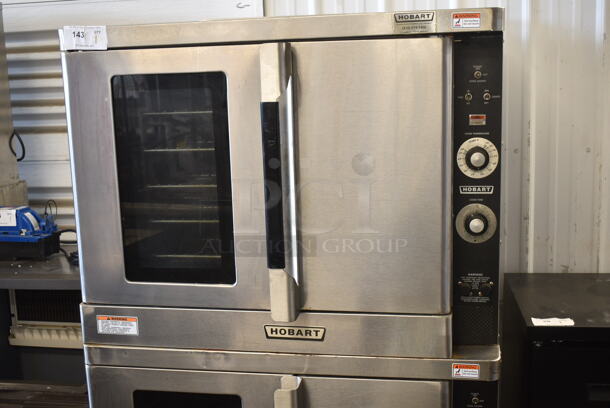 2 Hobart Stainless Steel Commercial Electric Powered Full Size Convection Oven w/ View Through Door, Solid Door, Metal Oven Racks and Thermostatic Controls on Commercial Casters. 208-240 Volts, 1/3 Phase. 2 Times Your Bid! - Image 2 of 9