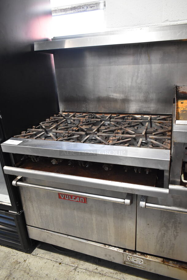 Vulcan VG260 Stainless Steel Commercial Natural Gas Powered 6 Burner Range w/ Right Side Flat Top Griddle, 2 Ovens, Over Shelf and Back Splash on Commercial Casters.   - Image 4 of 11
