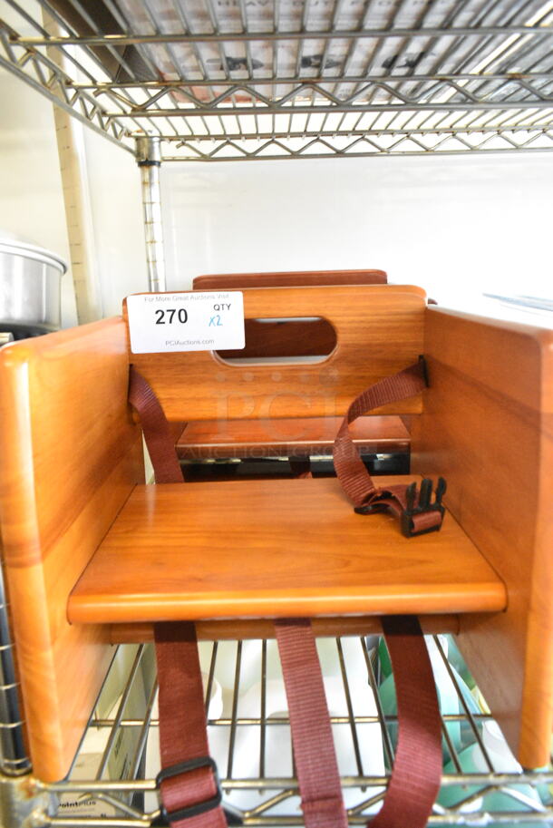 2 BRAND NEW SCRATCH AND DENT! Items Including Lancaster Table & Seating 164WDBSTWAL Unassembled Wooden Booster Seat with Walnut Finish and Lancaster Table & Seating Unassembled Wooden Booster Seat with Mahogany Finish. 2 Times Your Bid!   - Image 2 of 8