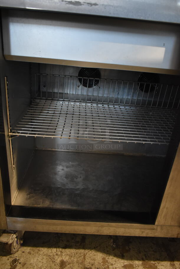 2014 Leader ESLM48S/C Stainless Steel Commercial Sandwich Salad Prep Table Bain Marie Mega Top on Commercial Casters. 115 Volts, 1 Phase. Tested and Powers On But Does Not Get Cold
 - Image 7 of 8