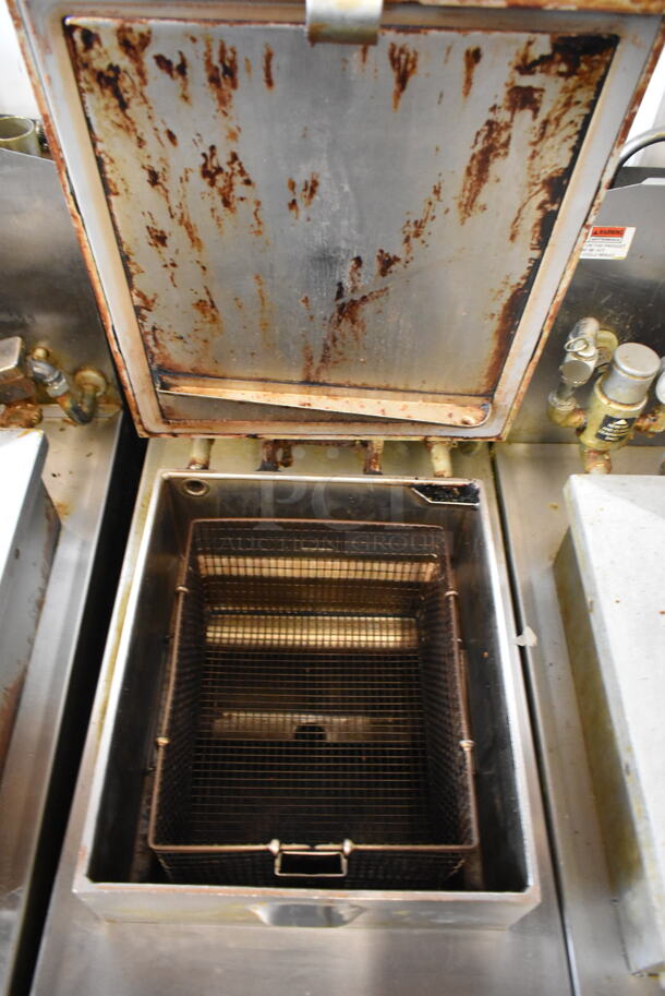 Henny Penny 600 Stainless Steel Commercial Floor Style Natural Gas Powered Pressure Fryer w/ Metal Fry Basket on Commercial Casters. 80,000 BTU. - Image 3 of 7