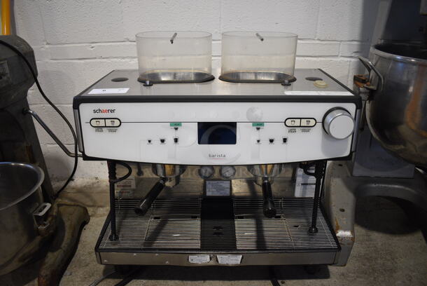 Schaerer Barista Stainless Steel Commercial Countertop 2 Group Espresso Machine w/ 2 Portafilters, 2 Steam Wands and 2 Hoppers. Hoppers Are Missing Lids. 208 Volts, 1 Phase. 29x22x30