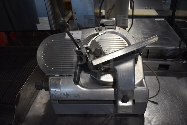 Hobart Model 2712 Stainless Steel Commercial Countertop Automatic Meat Slicer w/ Blade Sharpener. 120 Volts, 1 Phase. 27x26x27. Tested and Working!