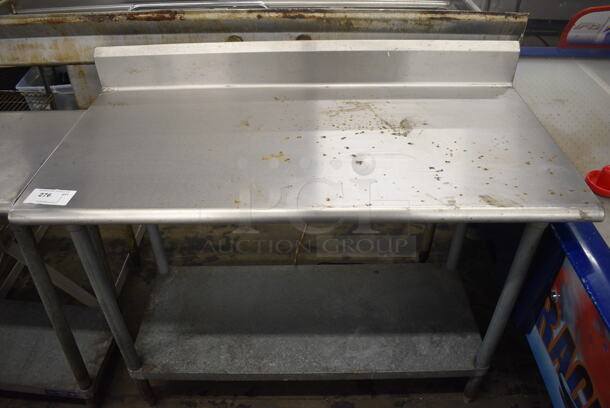 Stainless Steel Commercial Table w/ Back Splash and Metal Under Shelf. 48x24x40.5