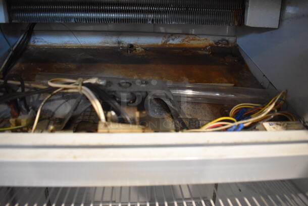 Beverage Air MT12 Metal Commercial Single Door Reach In Cooler Merchandiser w/ Poly Coated Racks. 115 Volts, 1 Phase. 24x26x64.5. Tested and Powers On But Does Not Get Cold - Image 4 of 5