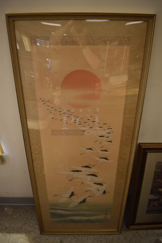 Framed Picture of Cranes Flying Into a Rising Sun