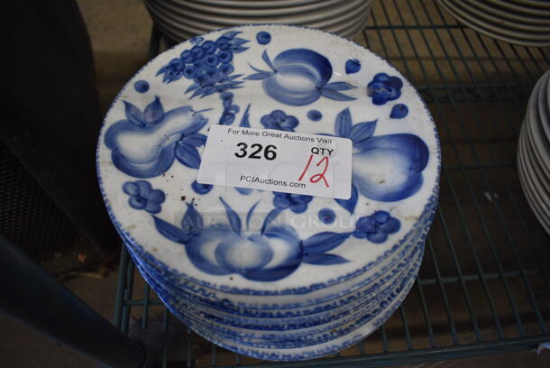 12 White and Blue Ceramic Plates. 9x9x1. 12 Times Your Bid!