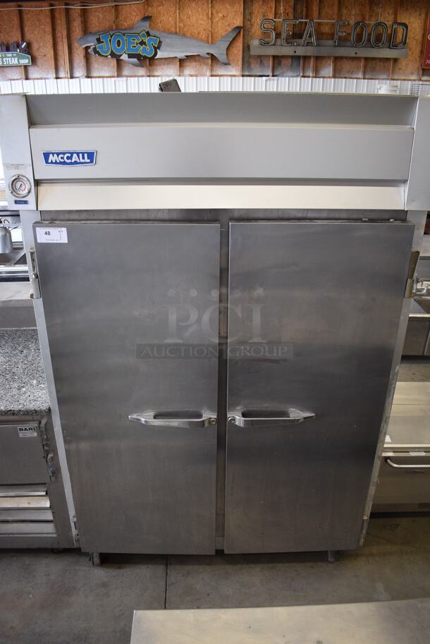 McCall Model 7-7045FTC Stainless Steel Commercial 2 Door Reach In Freezer on Commercial Casters. 115 Volts, 1 Phase. 55x35x84. Tested and Powers On But Temps at 49 Degrees