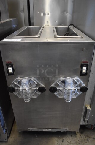 SaniServ A7581E Stainless Steel Commercial Countertop 2 Flavor Frozen Beverage Machine. 115 Volts, 1 Phase. 20x30x33