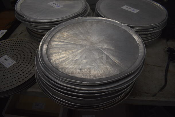 23 Metal Round Pizza Pans. 17x17x0.5. 23 Times Your Bid!